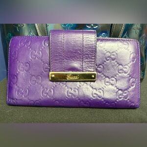 Authentic Gucci Guccissima leather flap continental wallet in purple